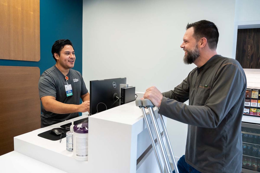 Man coming into Indigo Urgent Care for a sprained ankle